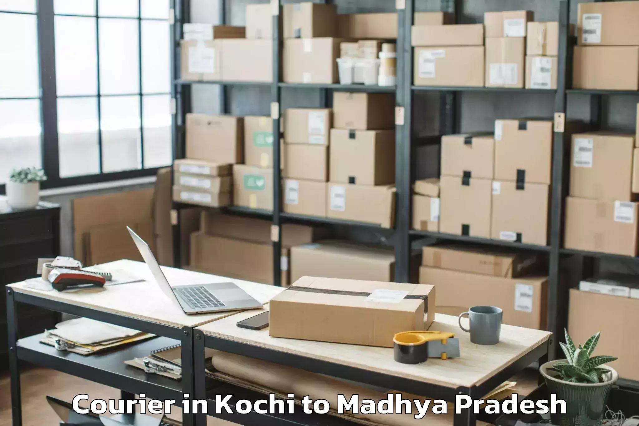 Professional Kochi to Porsa Courier